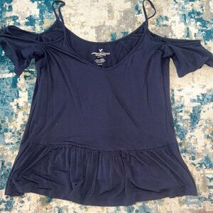 Off-shoulder blue top with bottom ruffles